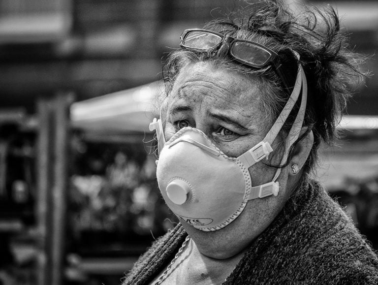 Photographs of the coronavirus lockdown-12 A woman wearing a face mask.