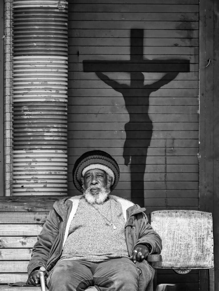 APRIL Rastafarian with crucifix graffiti