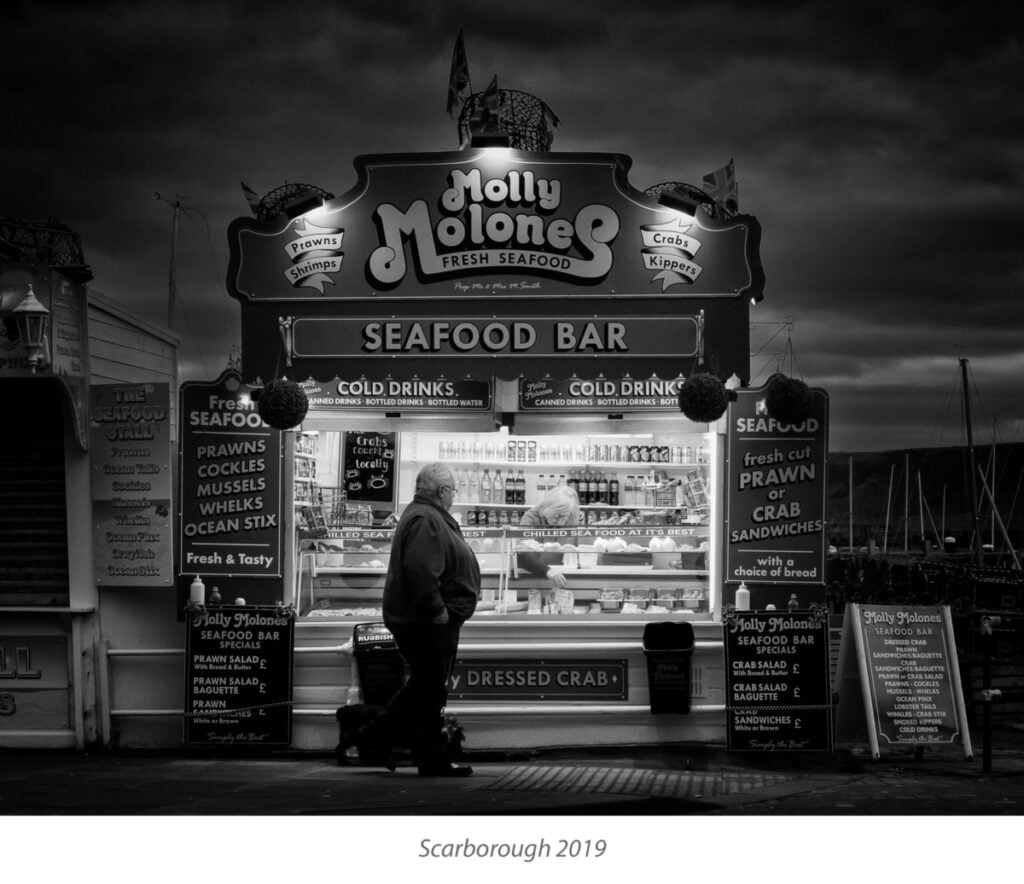 Seafood stall, scarborough at night