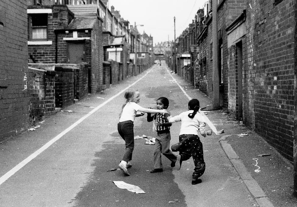 Children running in the street