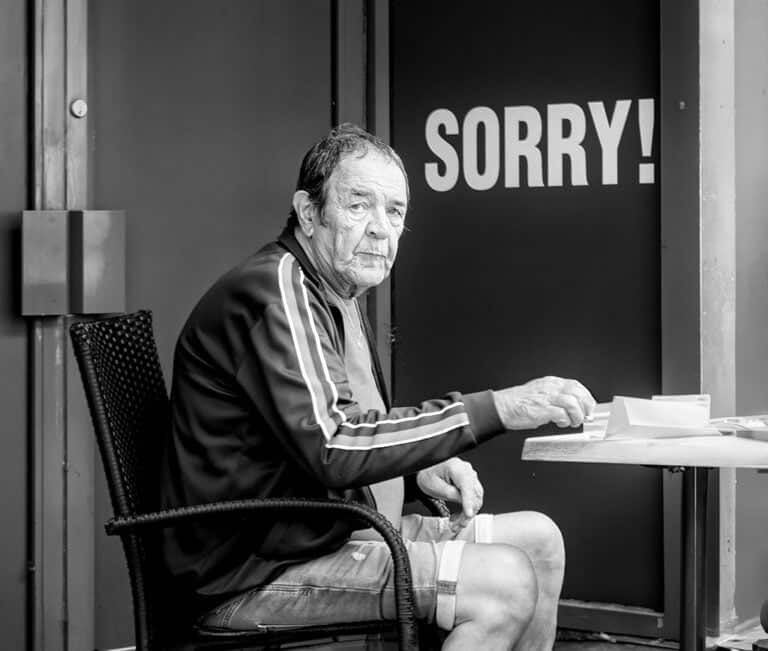 A man sitting at a table.