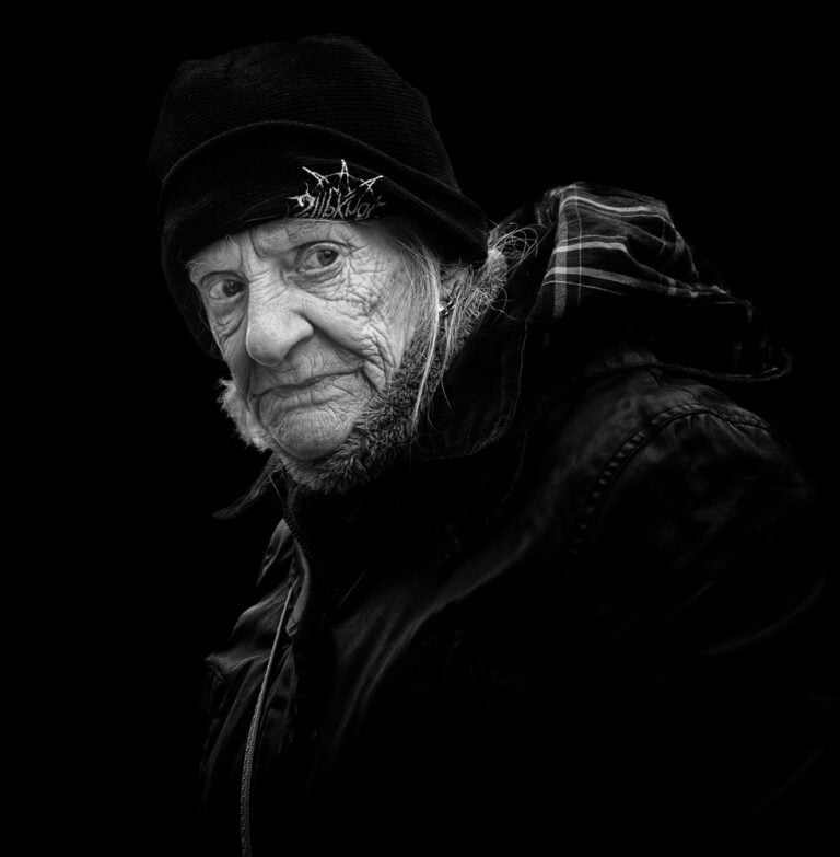 A black and white photo of an old man. A black and white photo of an old man.