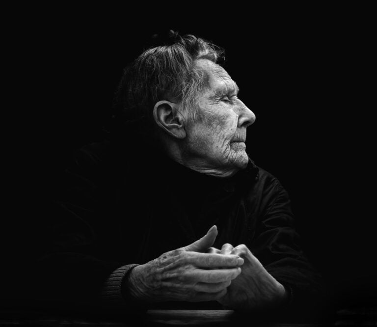 A black and white photo of an older man. A black and white photo of an older man.